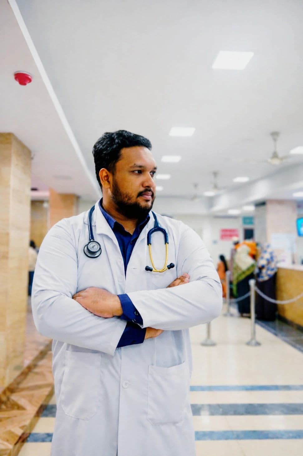 Portrait of Dr. Ak Mitra, General Practitioner